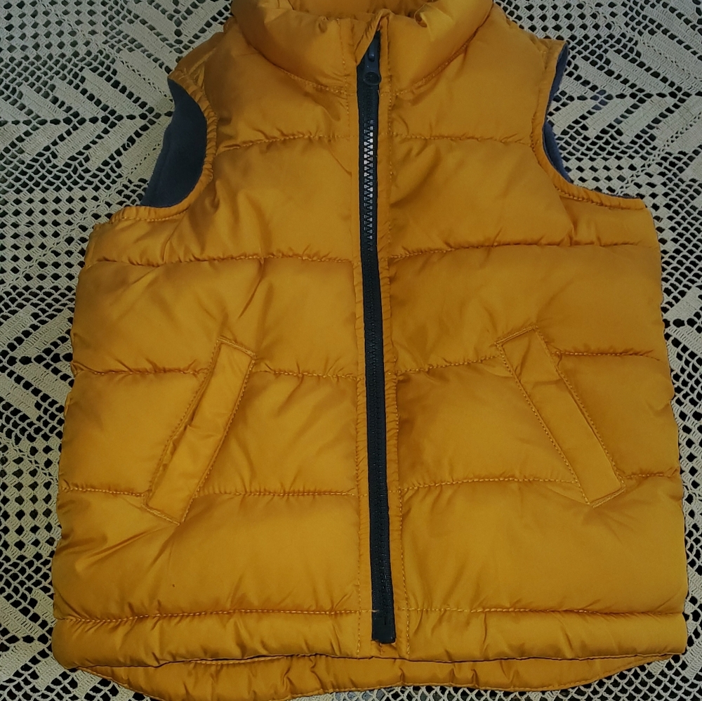 Yellow Old Navy kids puffy vest
